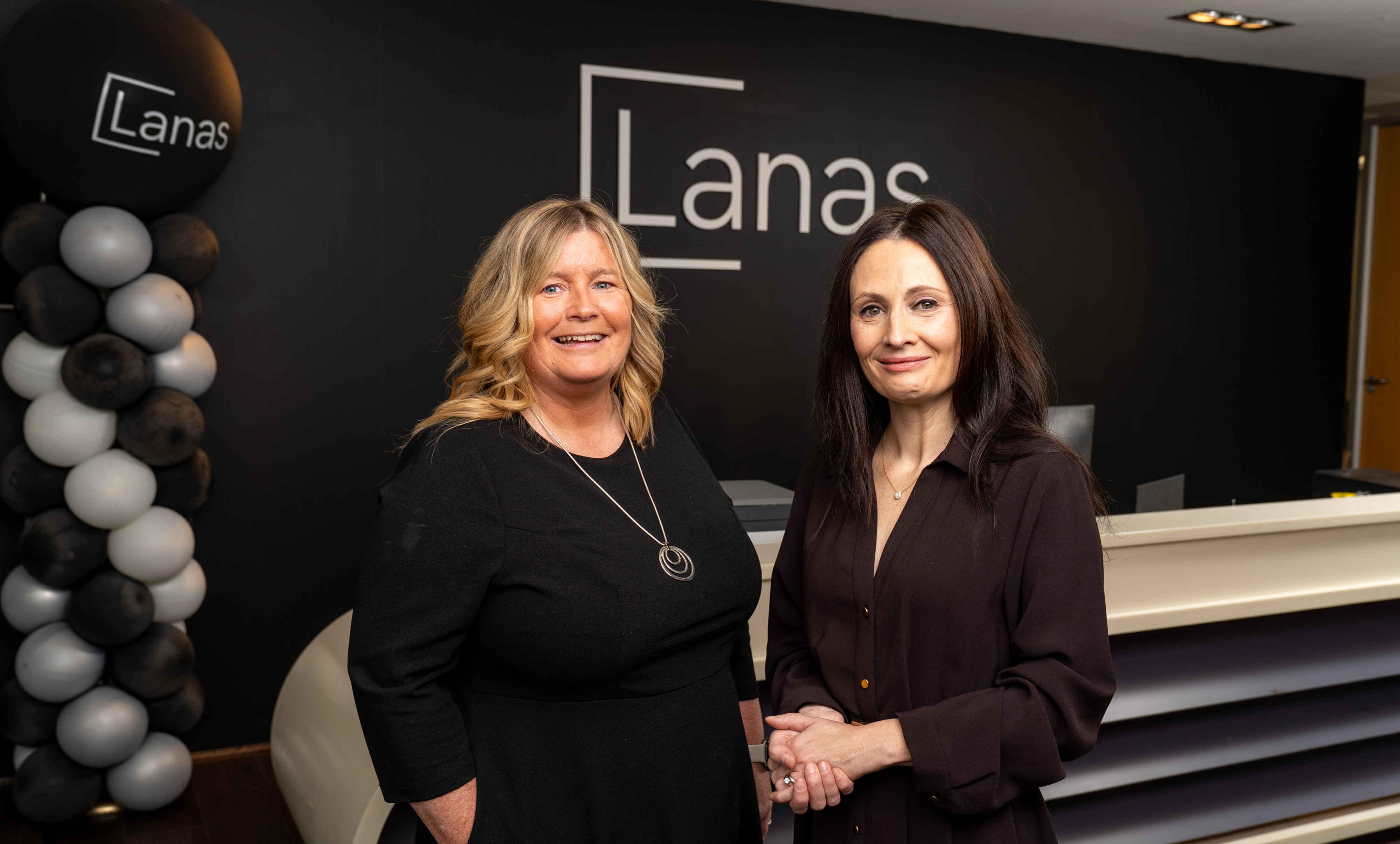 Lanas and Medical Protection representatives smile at camera